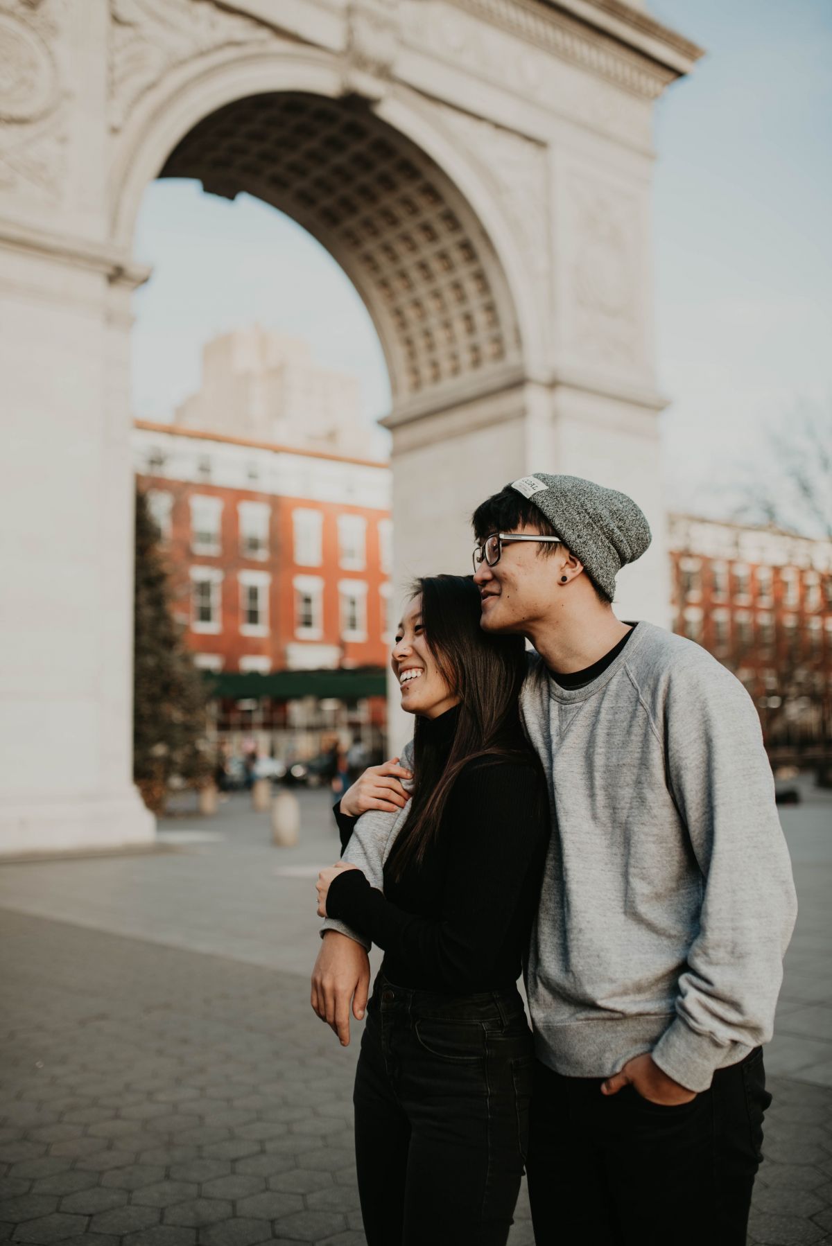 Staring off into the distance and laughing at other people.